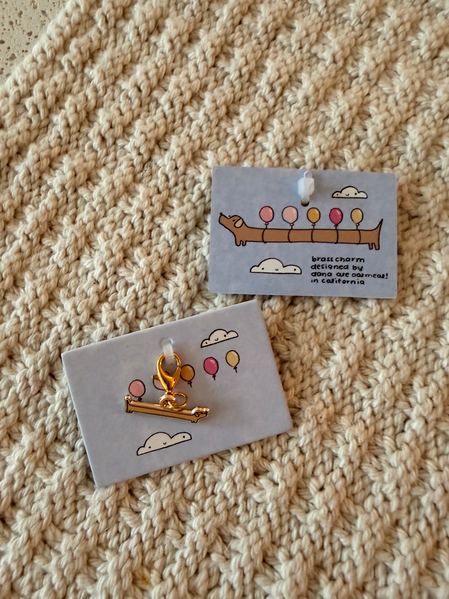 balloon dog brass charm