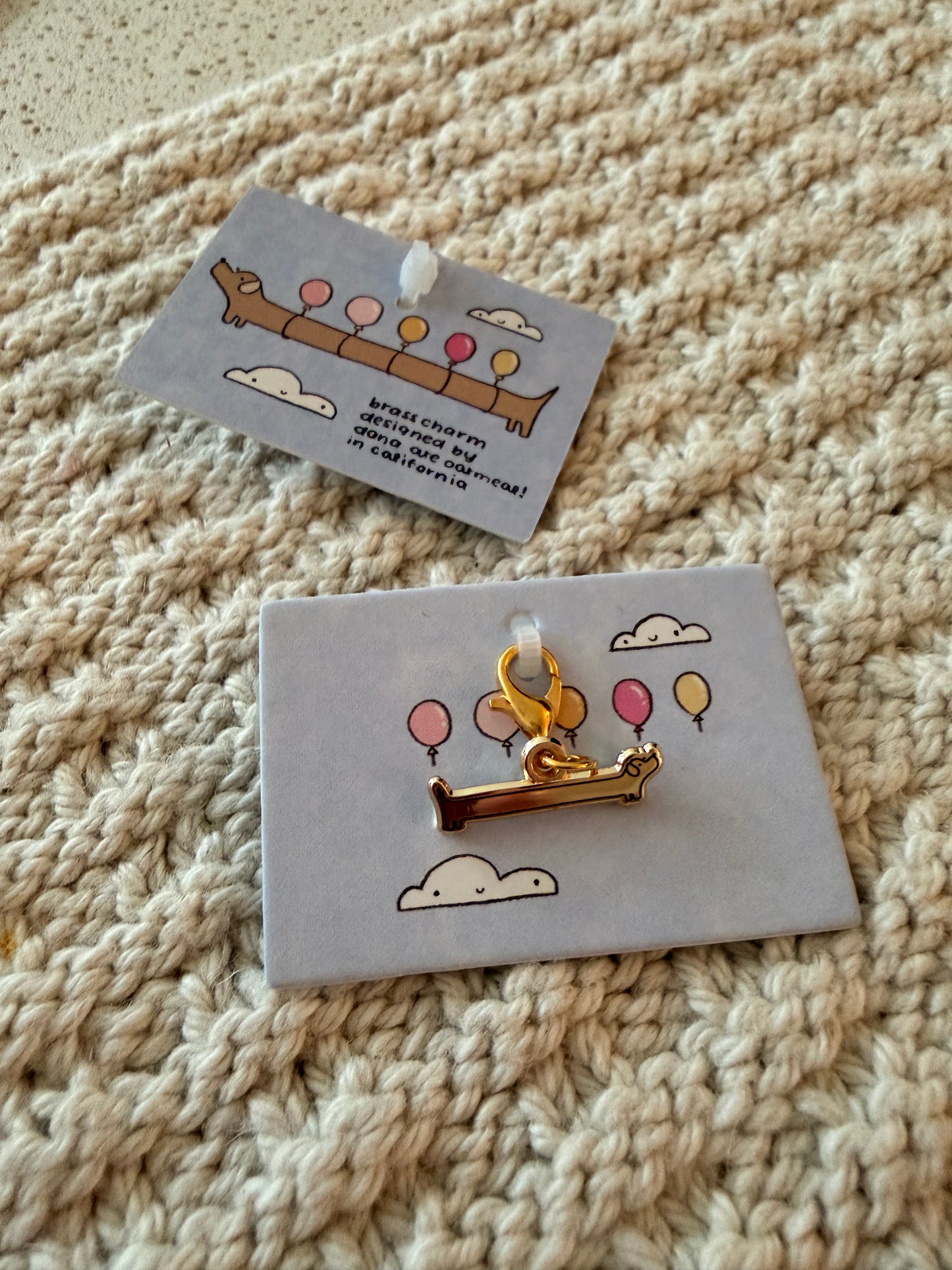 balloon dog brass charm